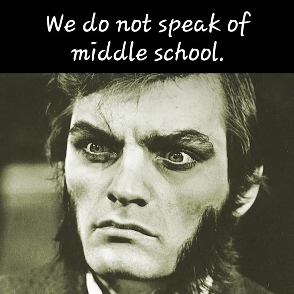 A sepia-toned photo of a mutton-chopped and wild-eyed man captioned, “We do not speak of middle school.”